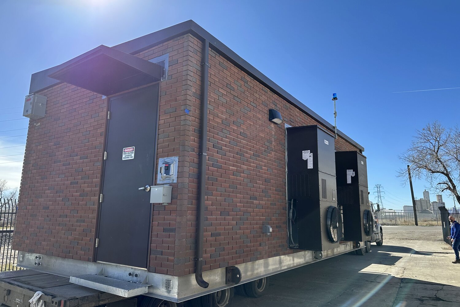 Traction power substation building — factory to trackside delivery